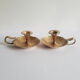 Pair of vintage oriental golden brass cellar candlesticks