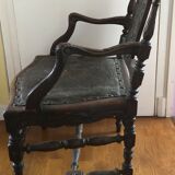 Old carved wooden armchair