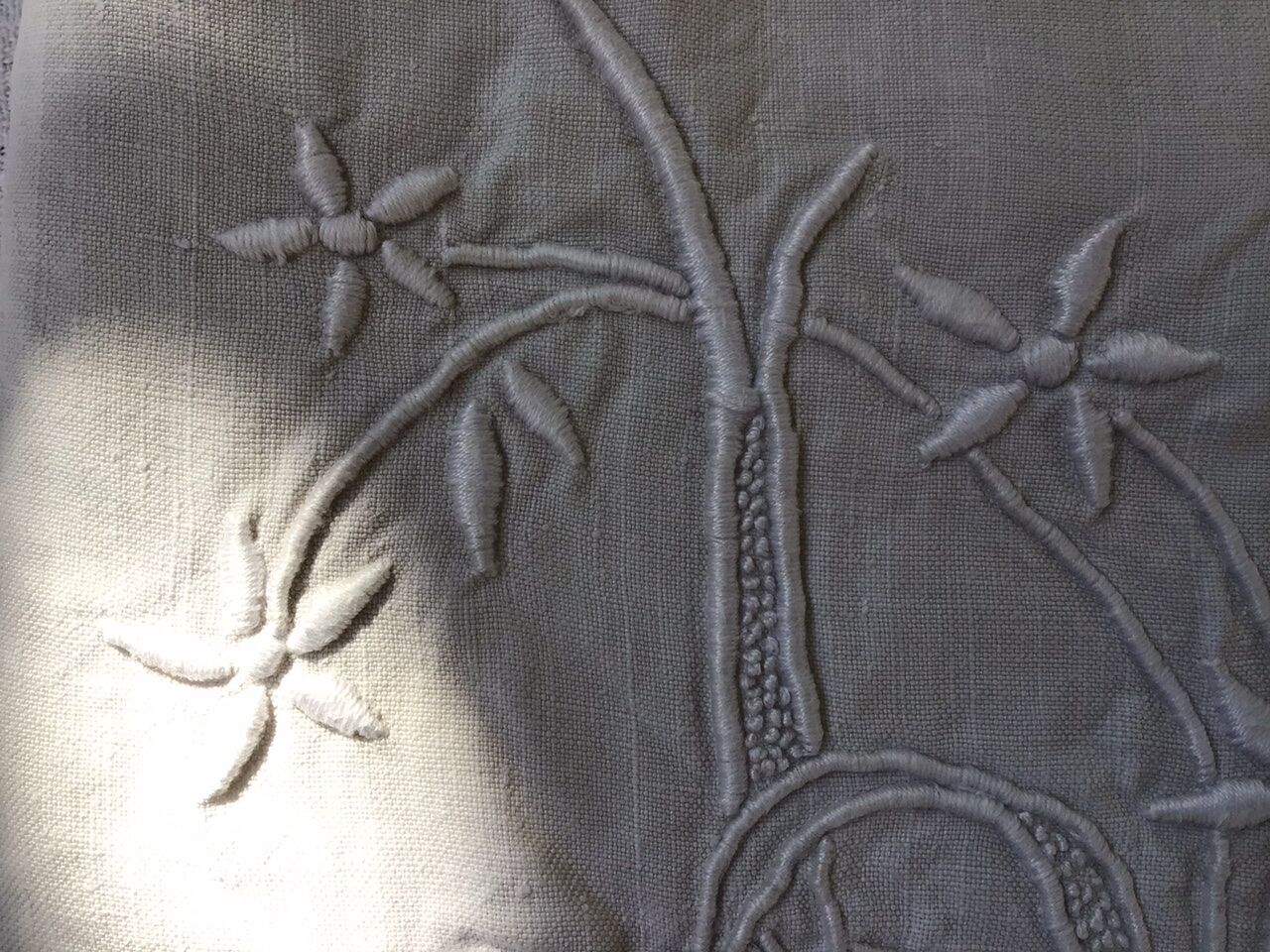 Embroidered linen sheet marked "JP"