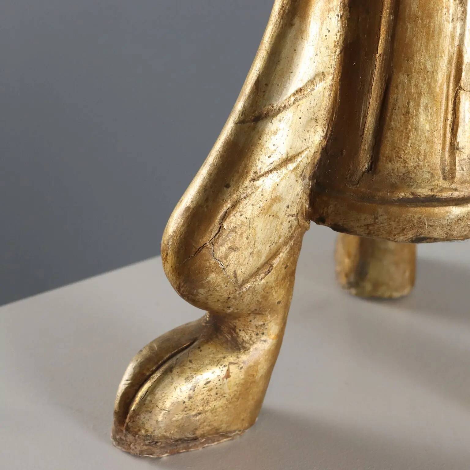 Antique carved and gilded wooden candelabrum, Italy, 19th century.