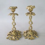 Pair of gilded bronze candlesticks with vine décor