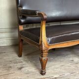 Napoleon III style bench in carved walnut, synthetic leather circa 1880