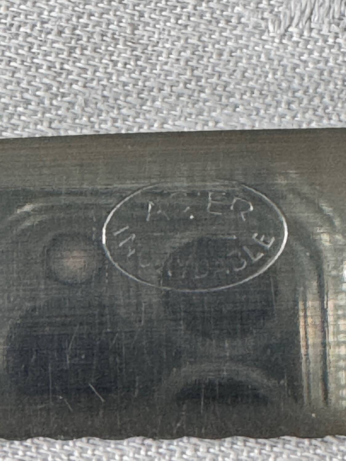 Series of 11 vintage serrated table knives