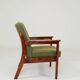 Fauteuil rétro en tissu boucle vert, forme ergonomique
