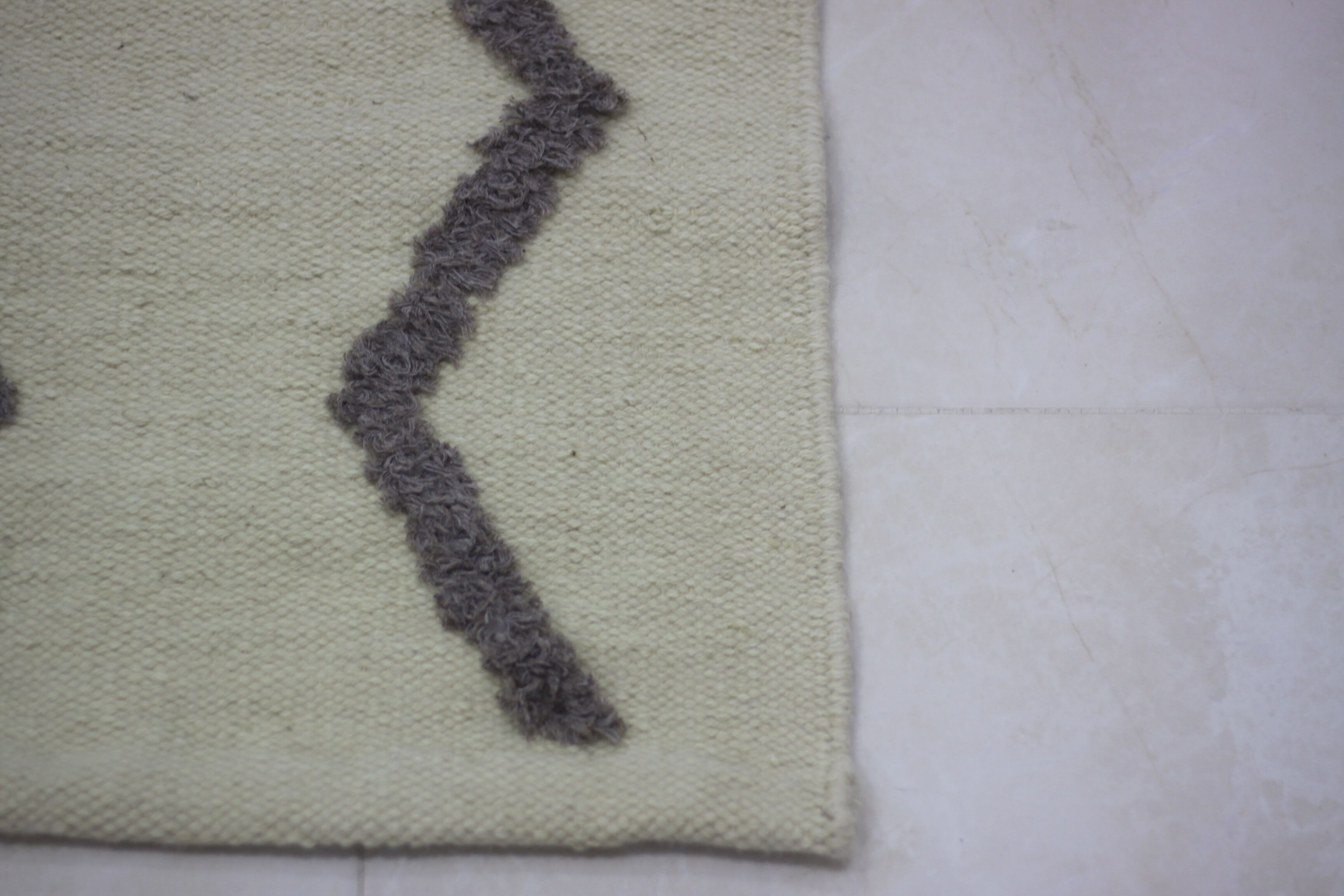 Handmade beige wool carpet 190x125cm