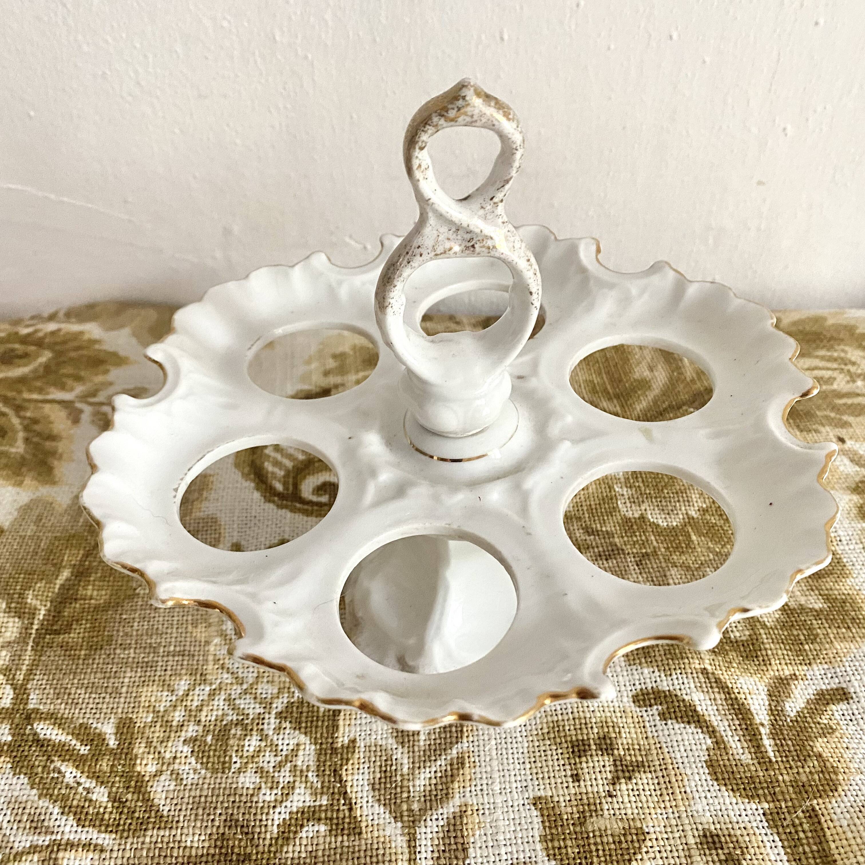 Early 20th century porcelain egg display