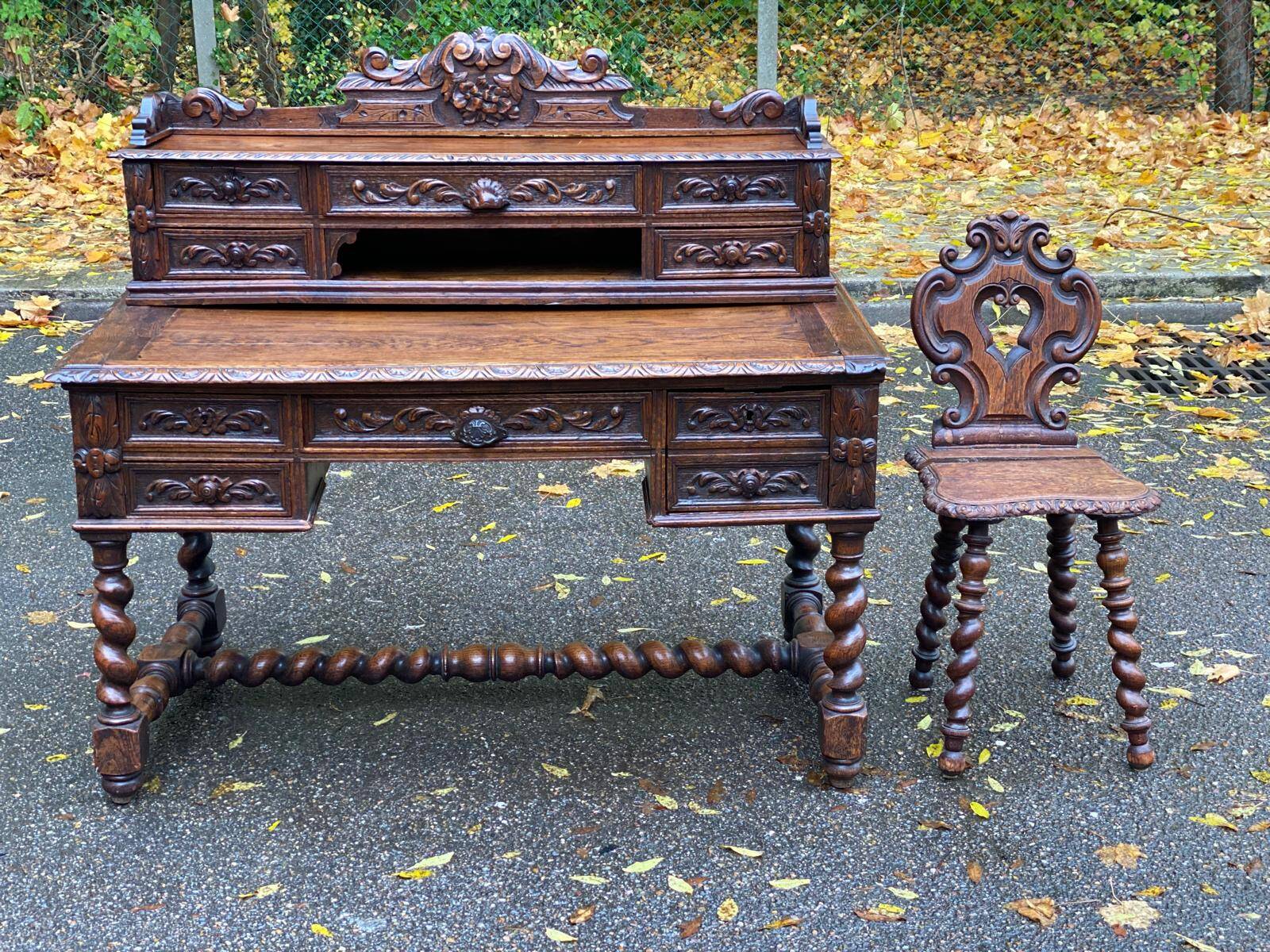 19th-century Renaissance carved oak desk with chair