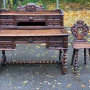 19th-century Renaissance carved oak desk with chair