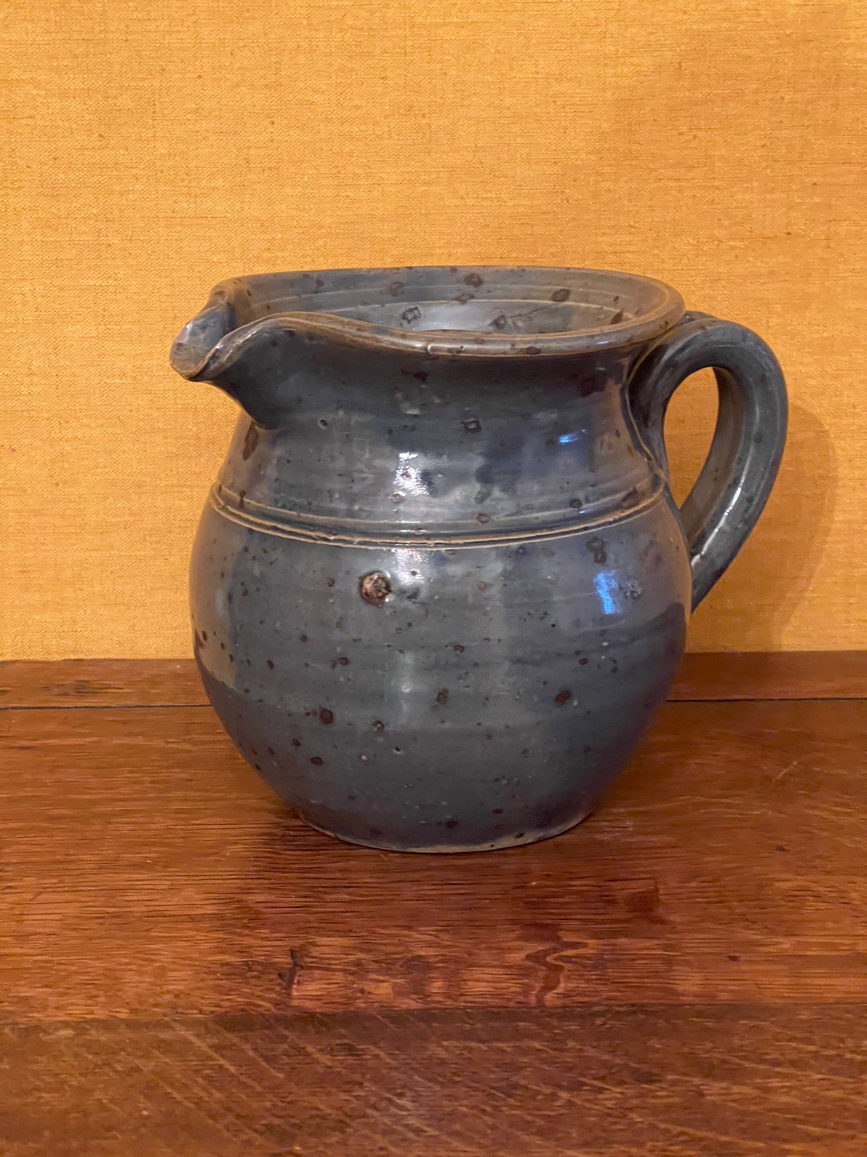 Artisanal pitcher in blue sandstone