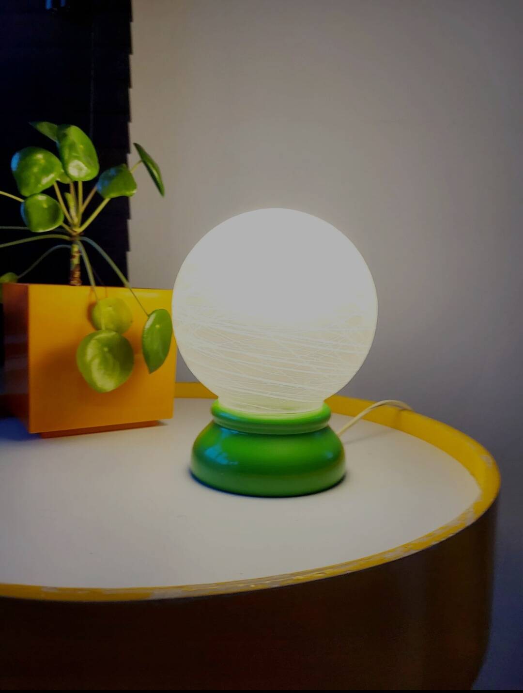 Vintage French table lamp with glass opaline shade and wooden green lamp base.