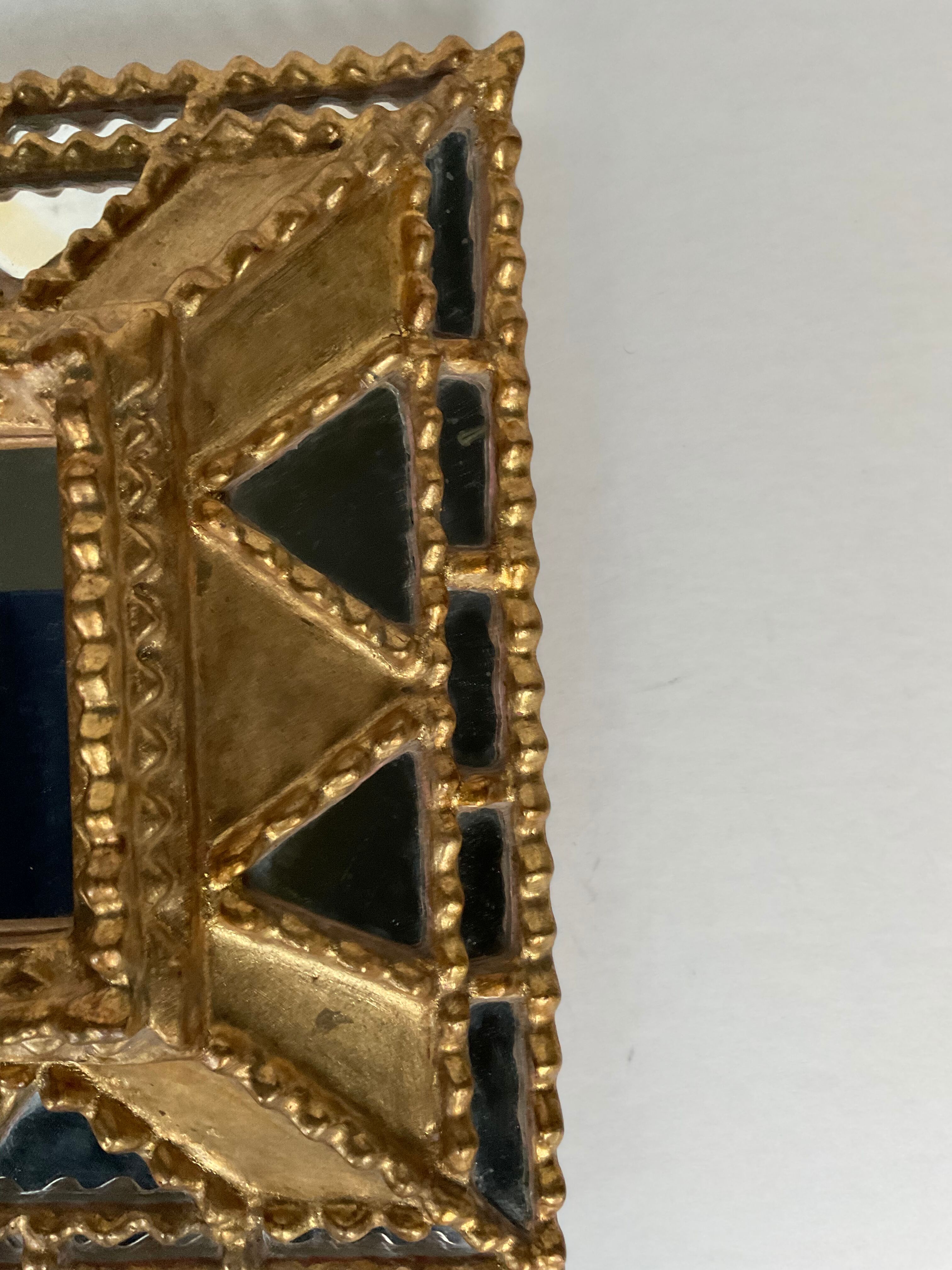 Mirror with parclose ien gilded wood