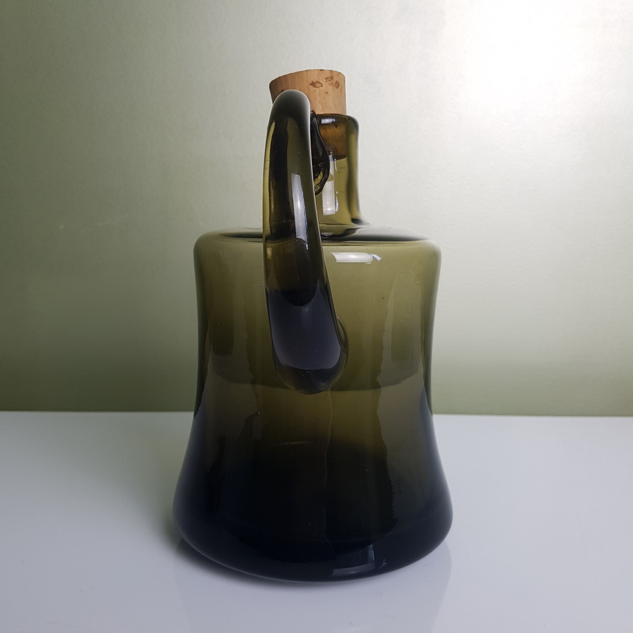 Thick handmade blown glass pitcher