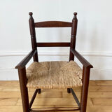 Wooden chair and children's straw