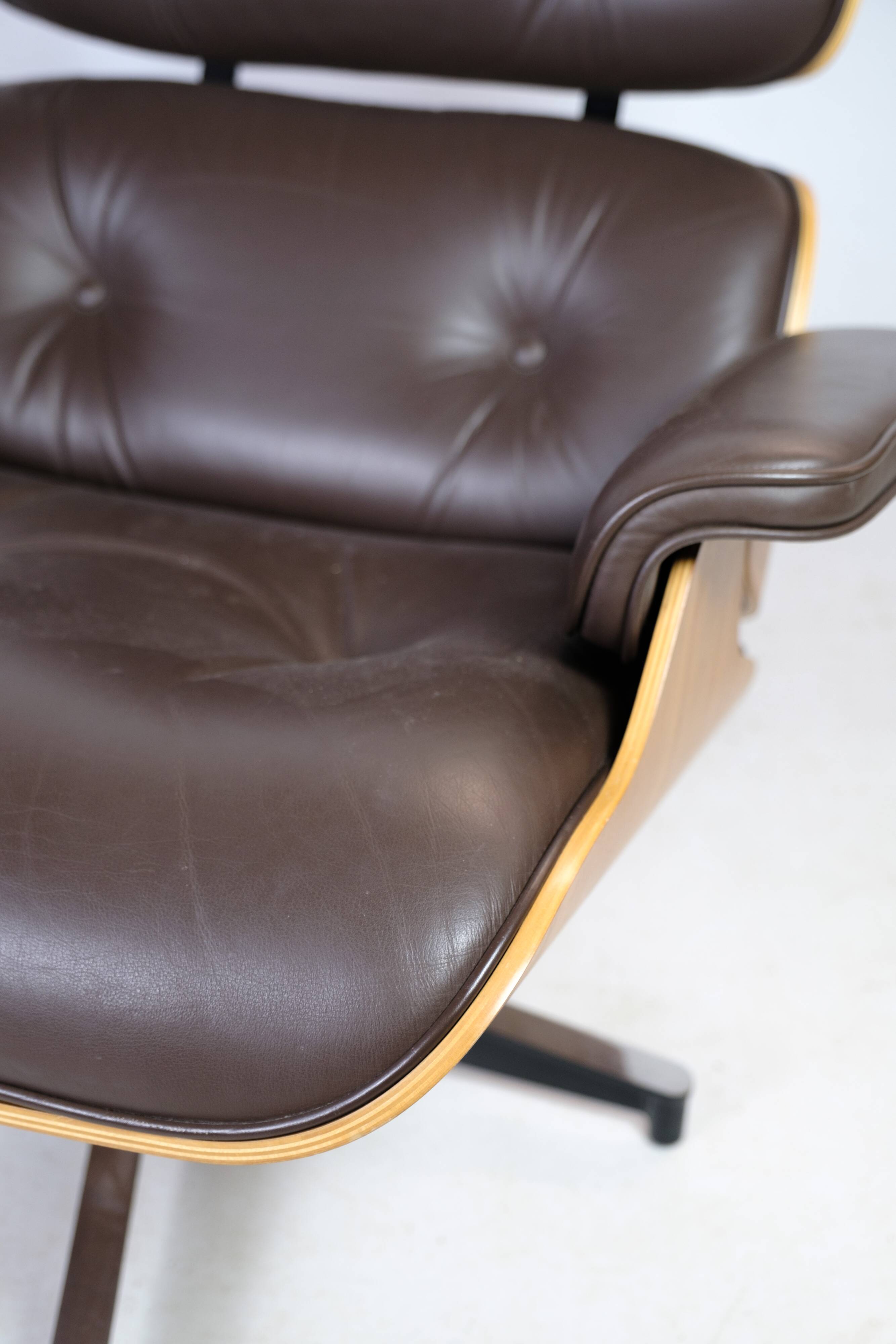 Charles Eames Lounge Chair In Brown Leather And Light Walnut