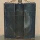 Art Deco fire screen from around 1920 in polished chrome with a bear.