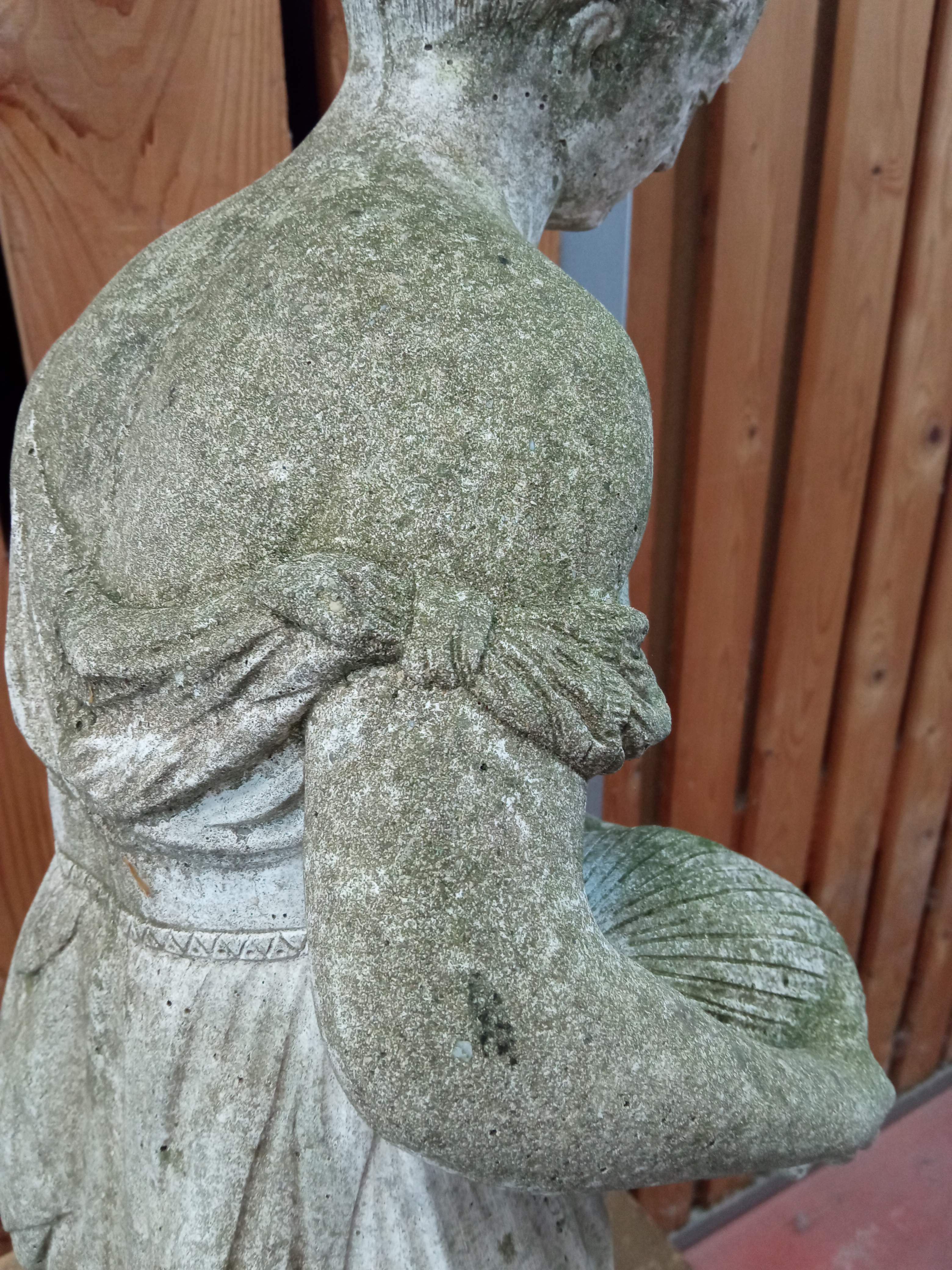 Reconstructed stone garden statue