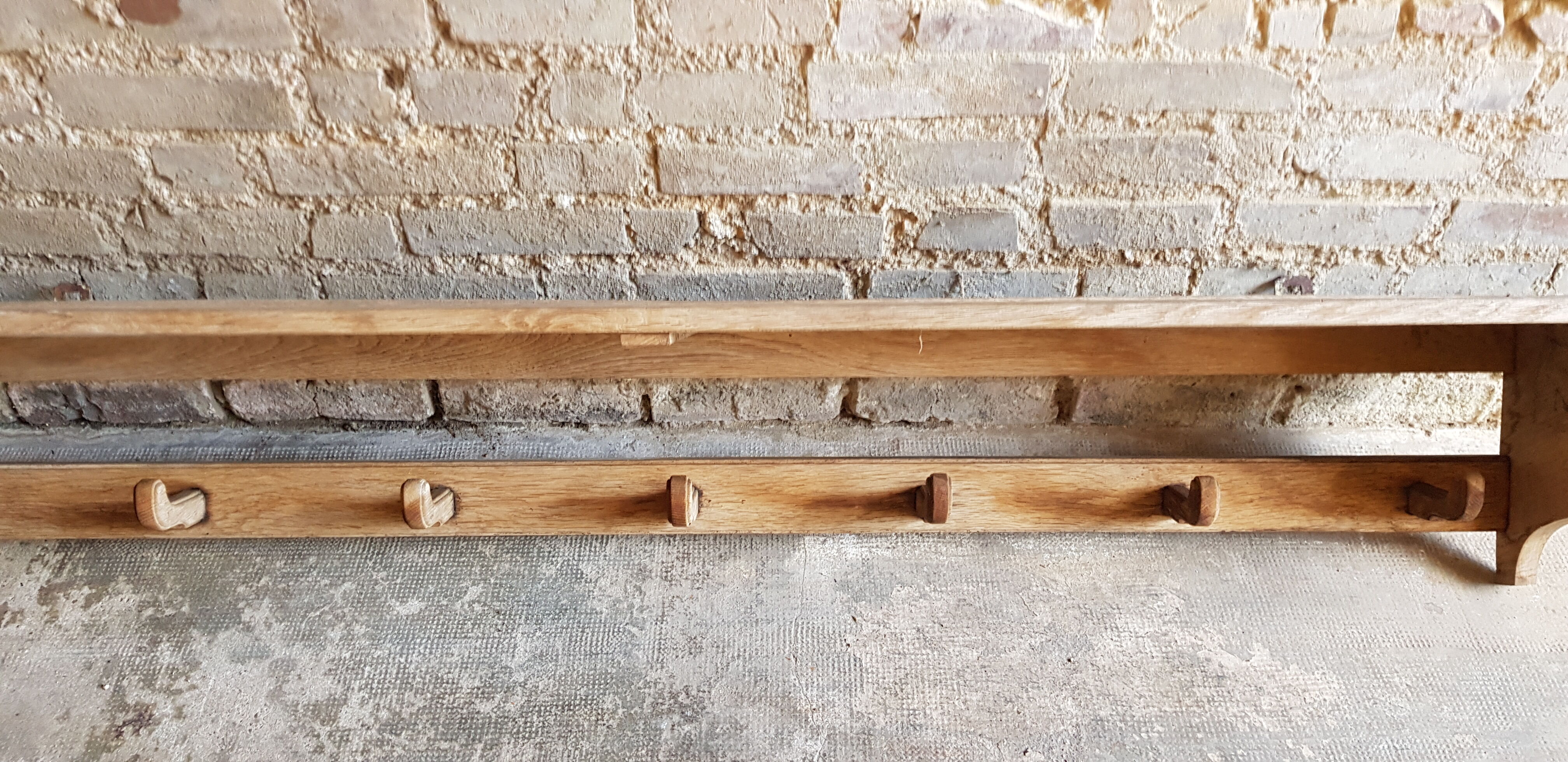 Mural coat rack