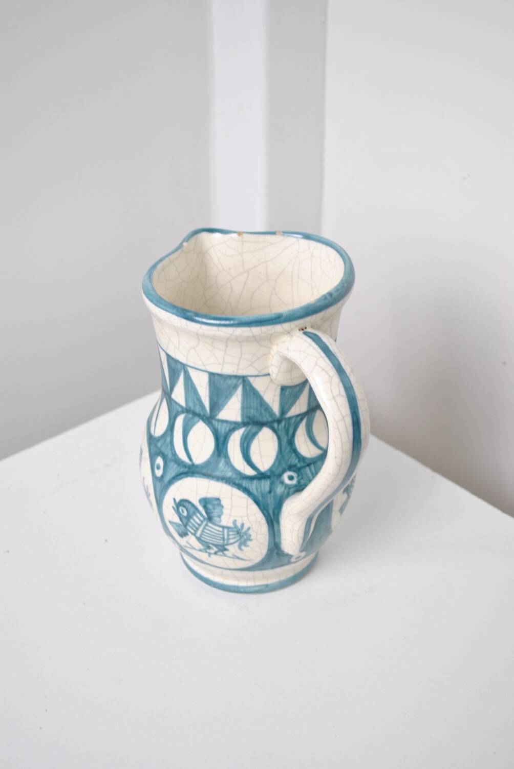 Cracked white earthenware pitcher 1960
