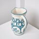 Cracked white earthenware pitcher 1960