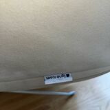 Two armchairs and a pop footstool from Roset