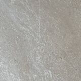 Travertine eye-shaped coffee table