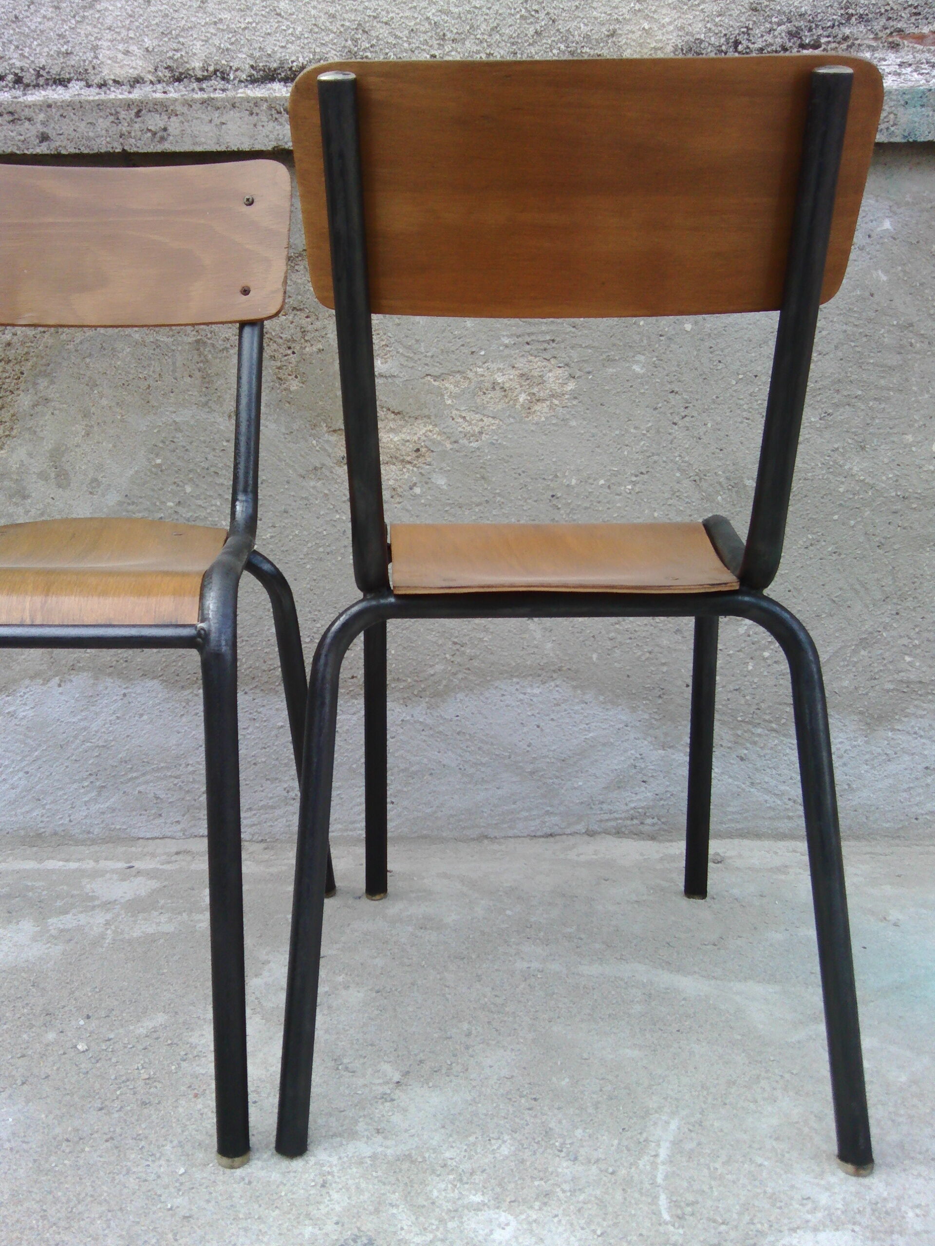 Two vintage school chairs