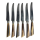 Six knives with steel blades and horn handles, Bonnaud Nancy, early 20th century.