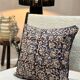 Indian cotton block print cushion with “flower” pattern - indigo blue