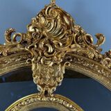 Grand miroir style Louis XV en bois sculpté et doré, XIXe siècle