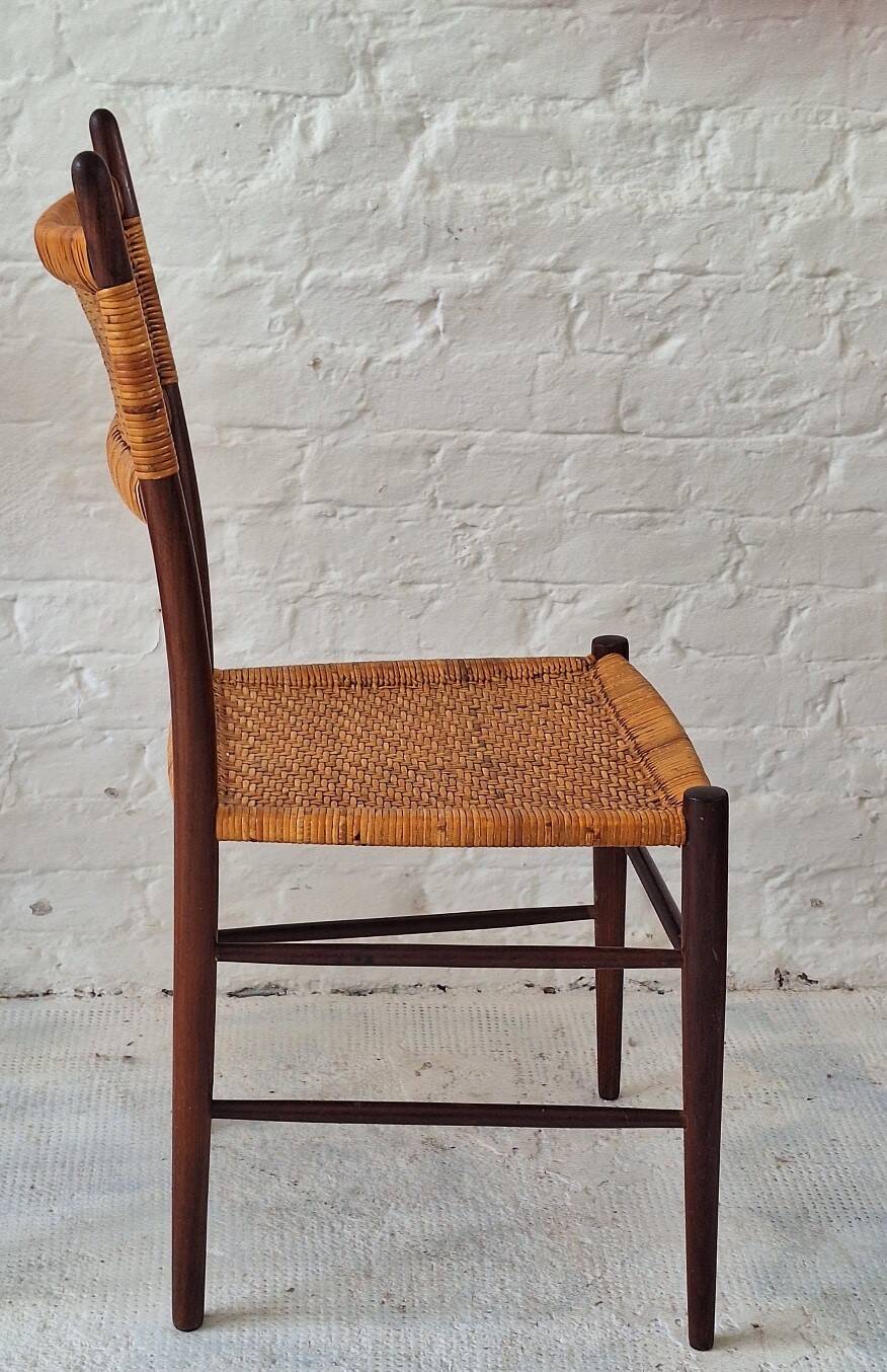 Four teak dining chairs with patinated cane after Gio Ponti, Italy 1960s