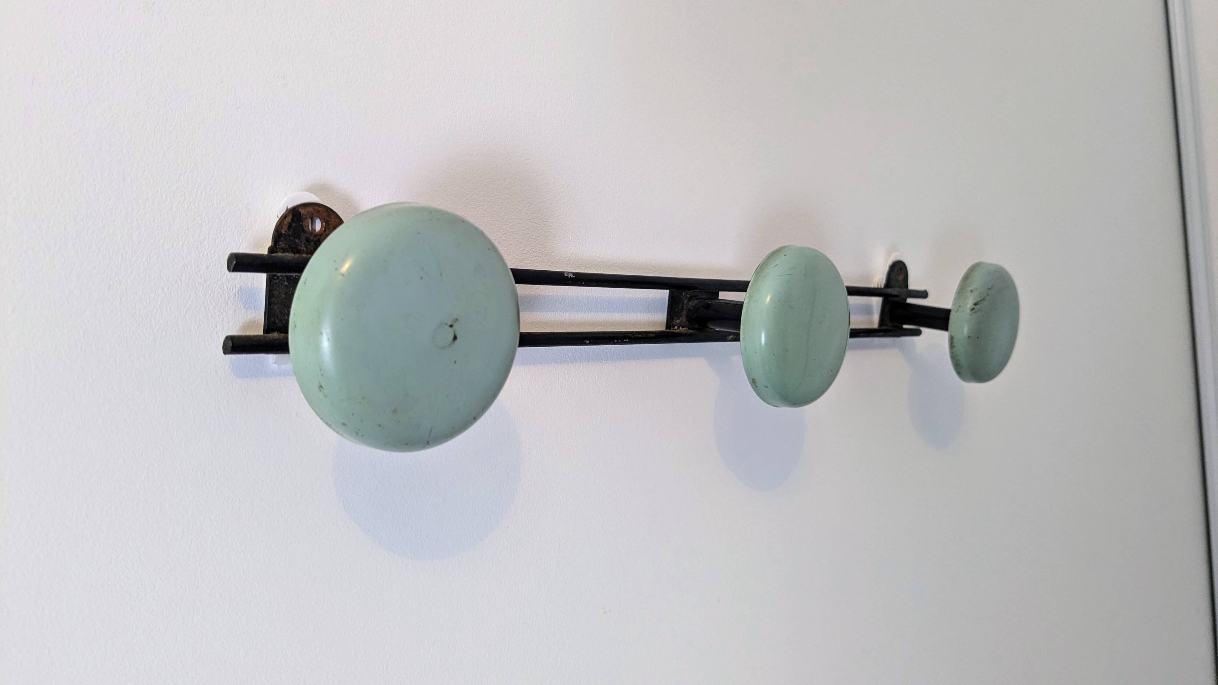 Vintage green metal triple coat hook