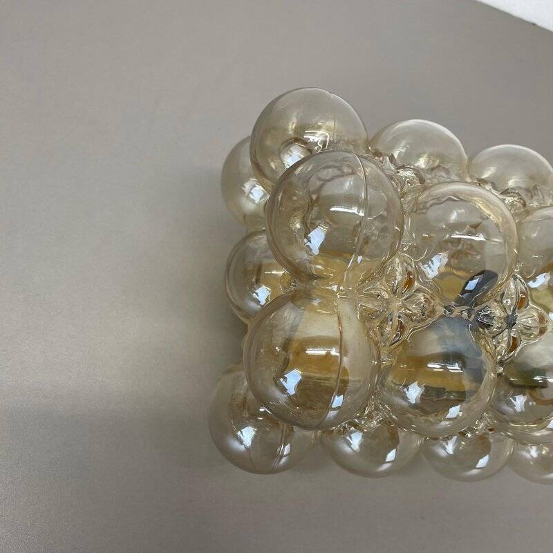 Amber vintage glass wall lamp by Helena Tynell for Glashütte Limburg, 1970s