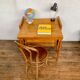 Modernist vintage chest of drawers in light chene has 3 drawers rattan top changing table