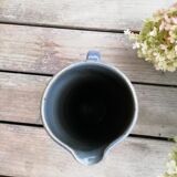 High pitcher in sandstone