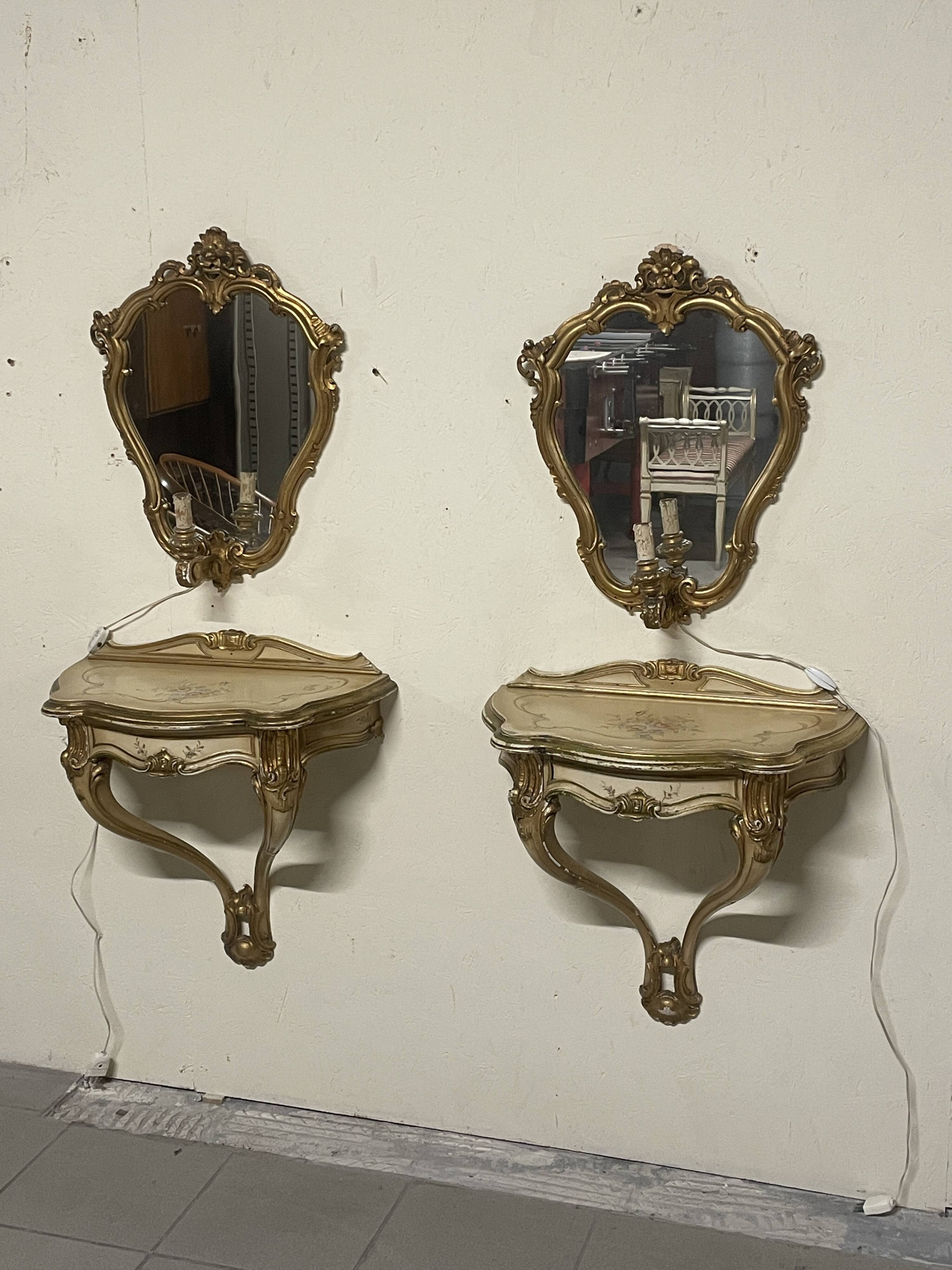 Pair of wall-mounted consoles with a mirror in Louis XV style.