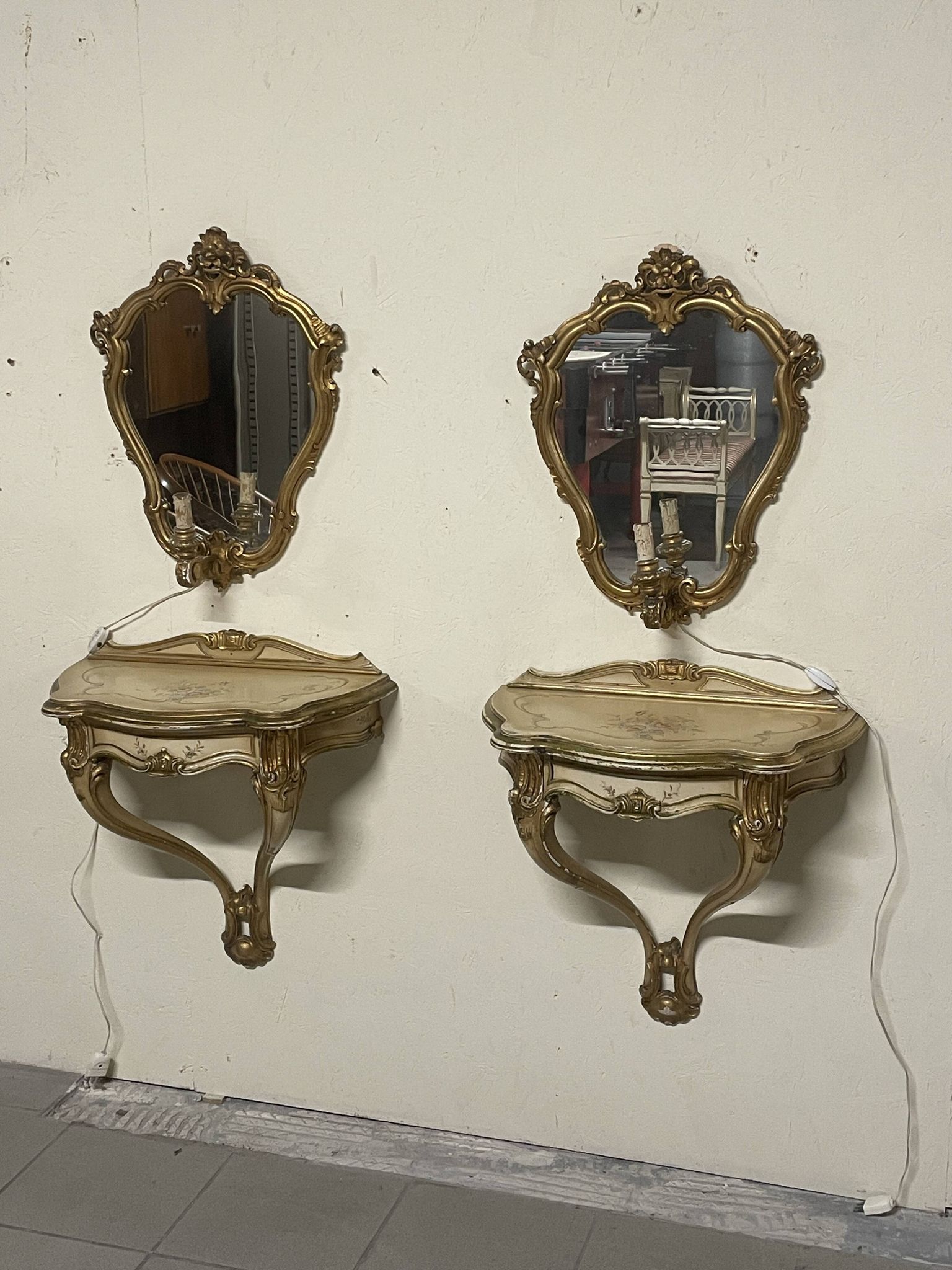 Pair of wall-mounted consoles with a mirror in Louis XV style.
