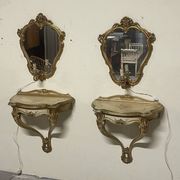 Pair of wall-mounted consoles with a mirror in Louis XV style.