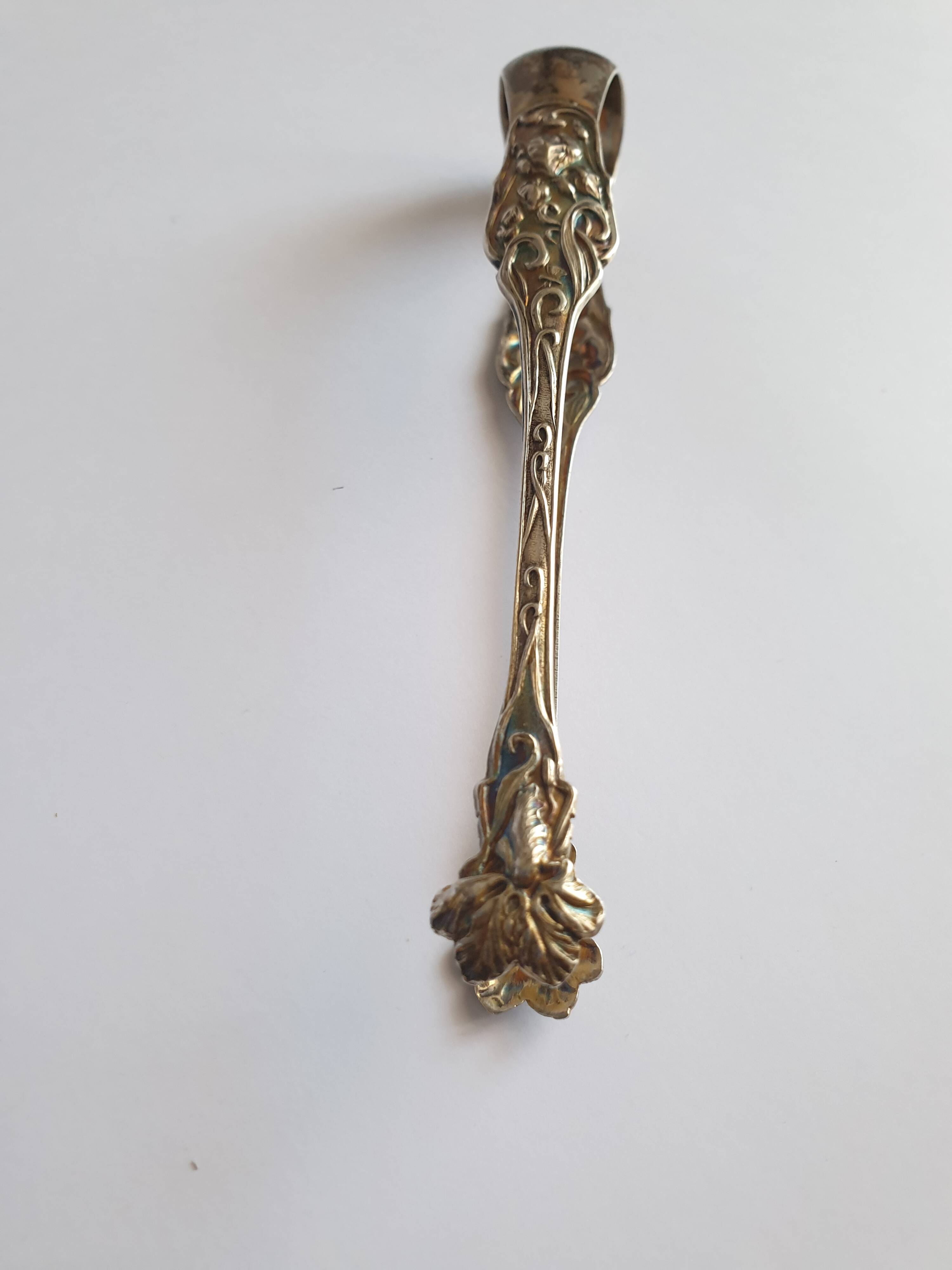 Art Nouveau sugar tongs in solid silver and vermeil