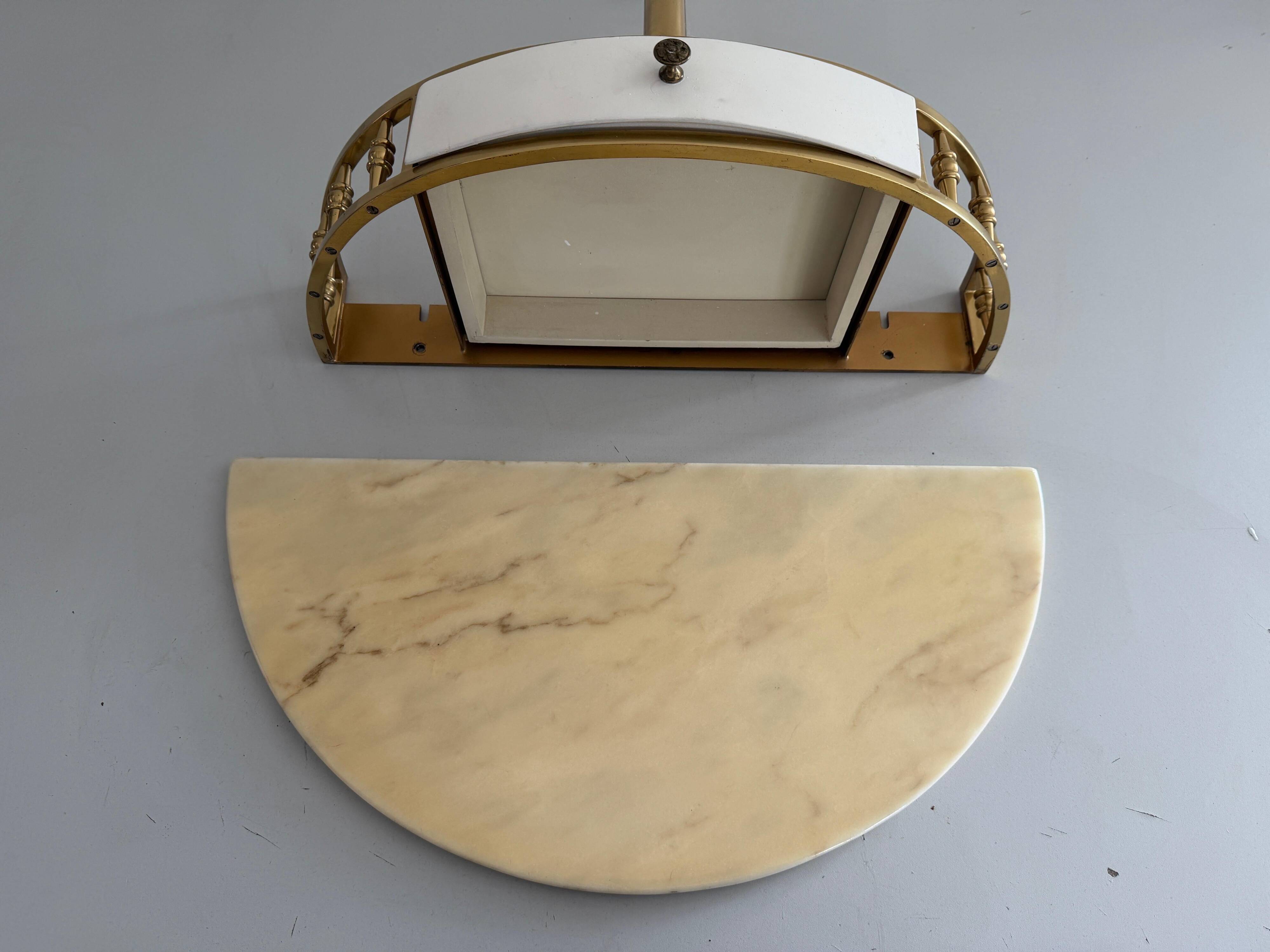 Floating wall console with drawer, brass body and marble top, 1960s, Italy