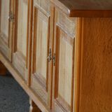 Modern Danish low enfilade in oak with panelled doors, mid-20th century.