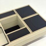 Modular white coffee table designed by Carlo Hauner for Forma