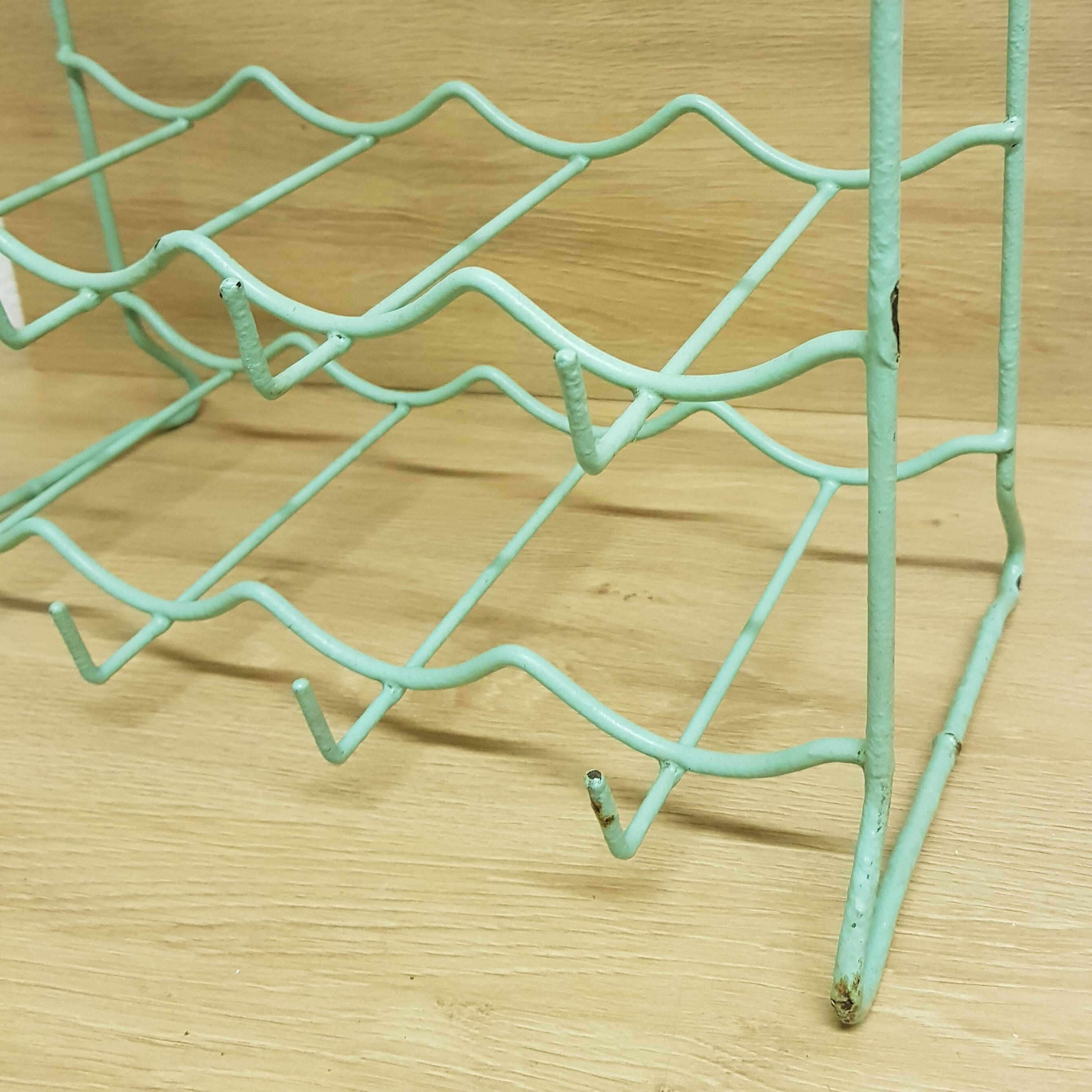Metal aqua green bottle rack