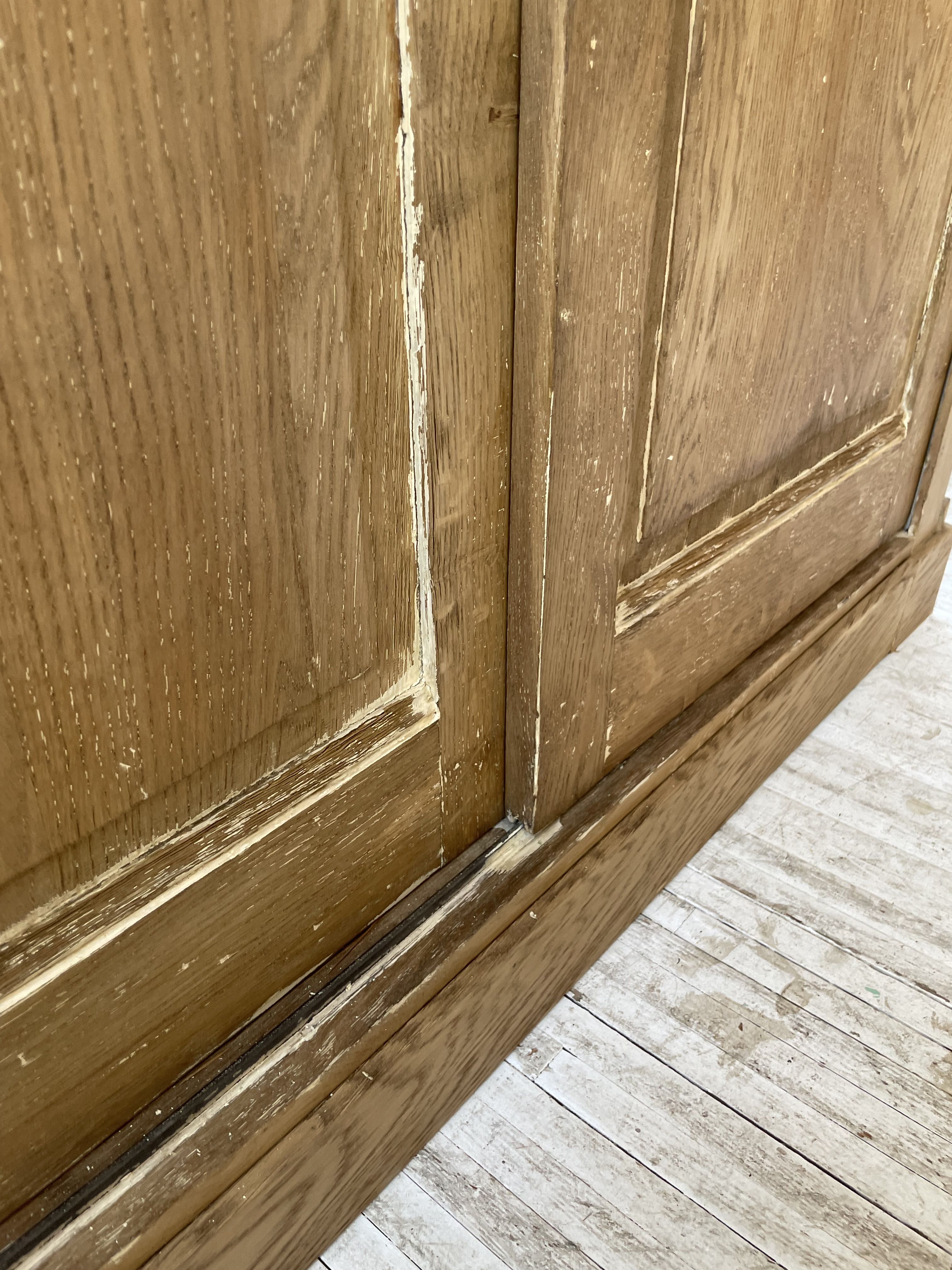 Large row of solid oak loom sliding doors