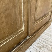 Large row of solid oak loom sliding doors