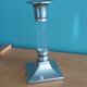 Silver-plated metal candlestick and lucite plexiglass