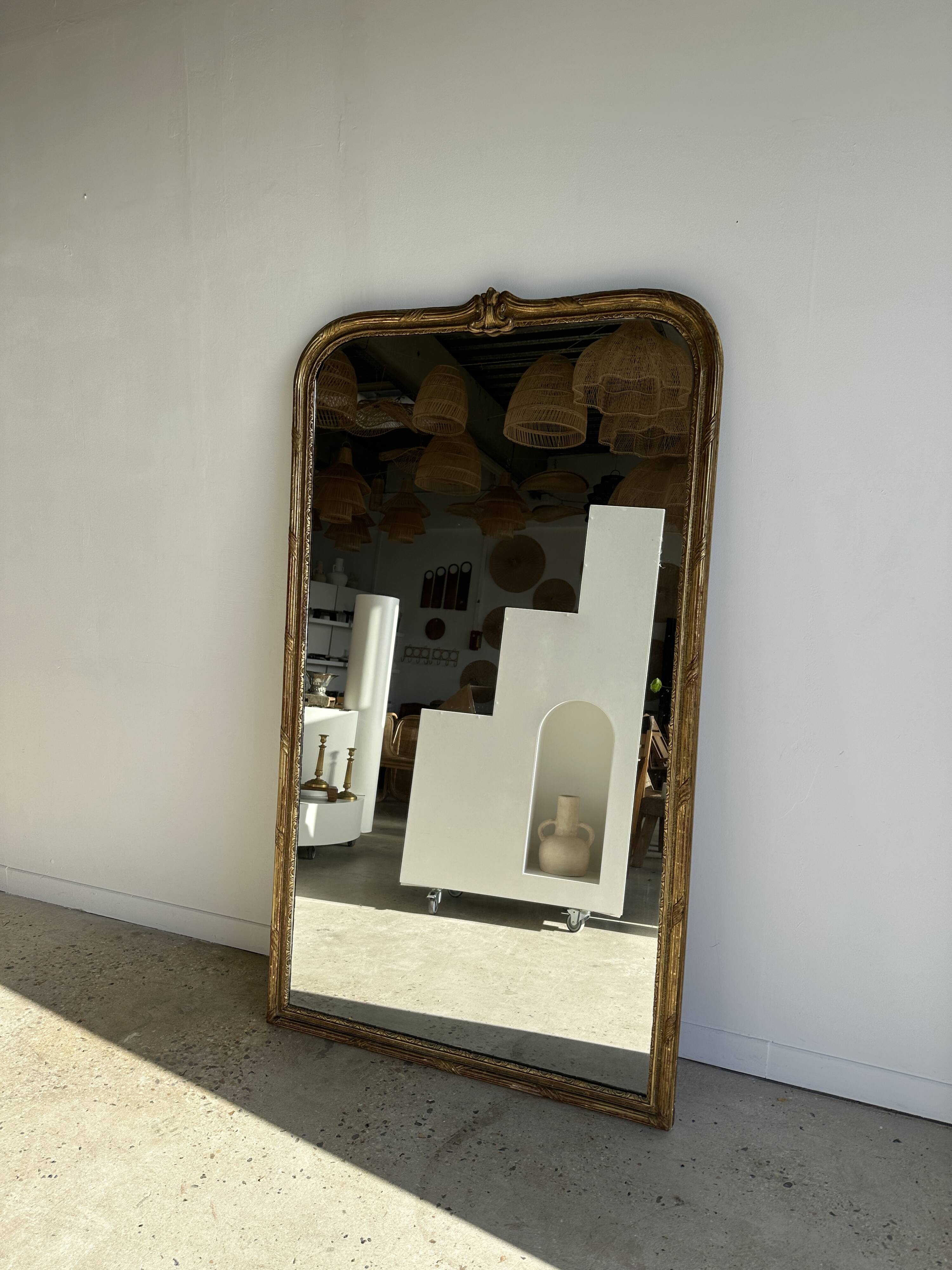 Large gilded mirror 19th century rounded corners mercury glass Louis XVI style