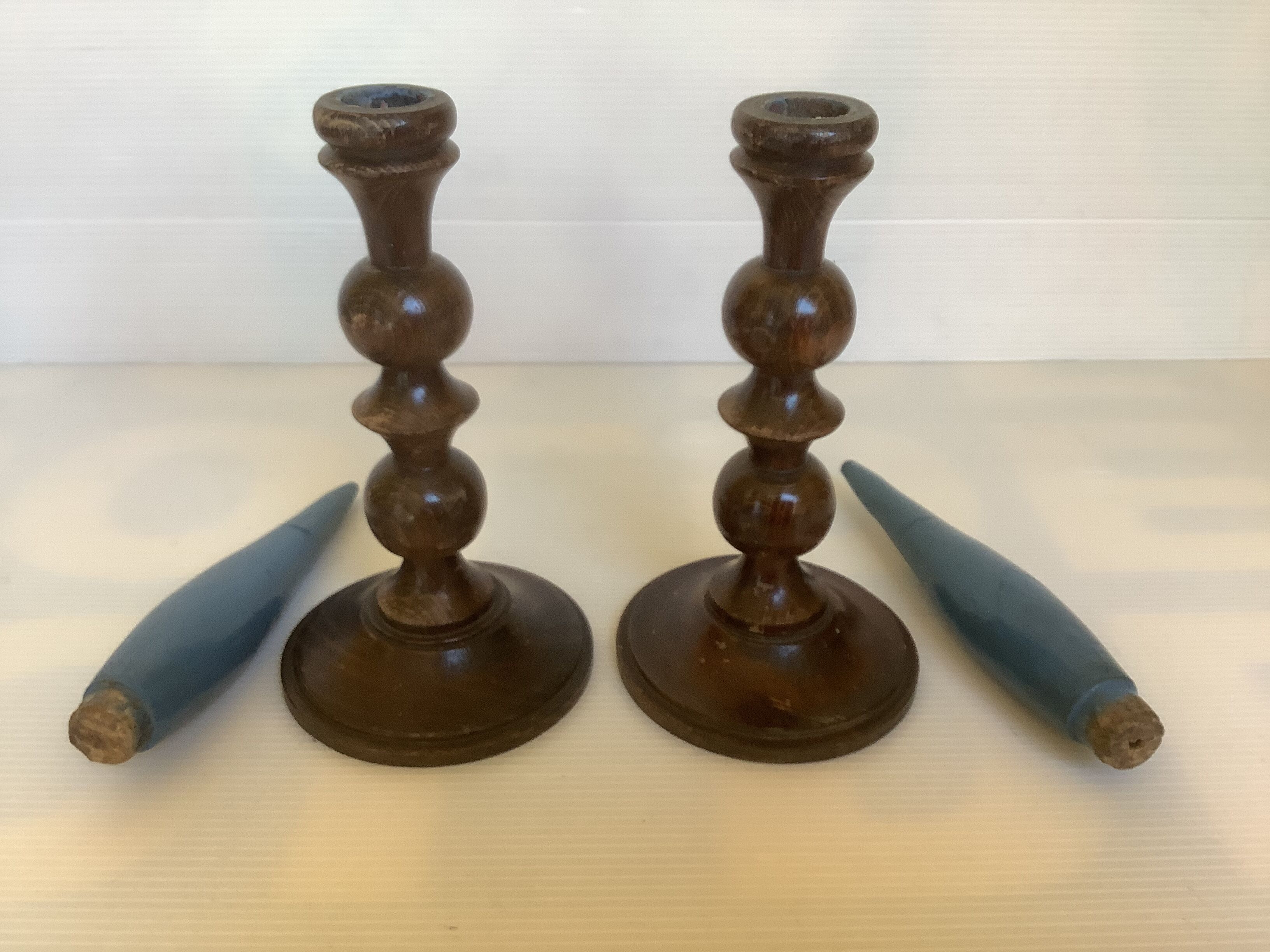 Pair of old candlesticks wood candles dummy blue wood