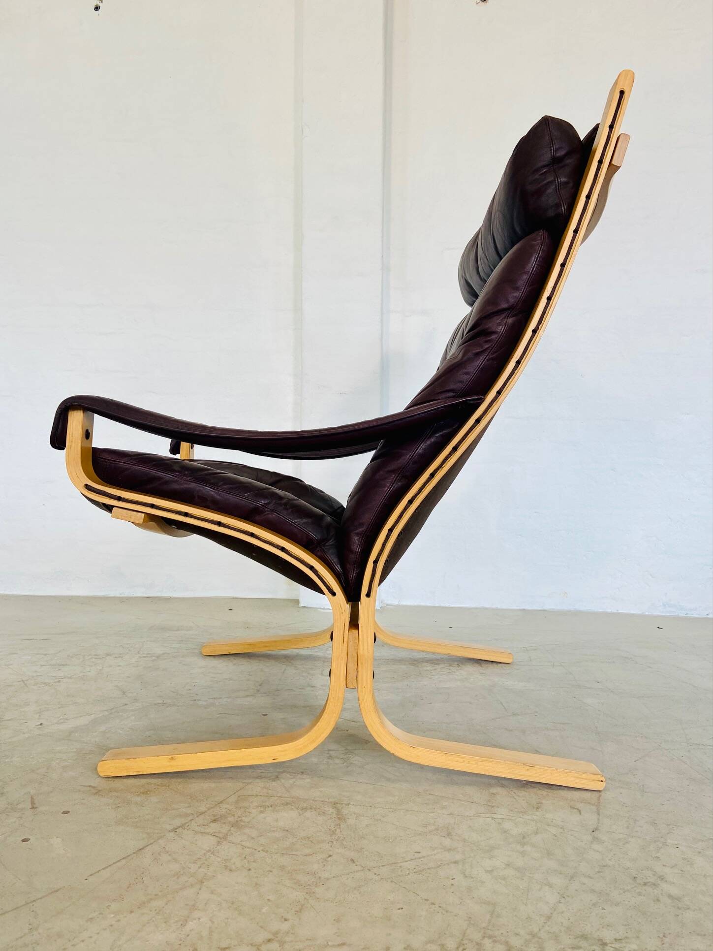 Vintage mid-century scandinavian brown leather lounge chair by ingmar relli