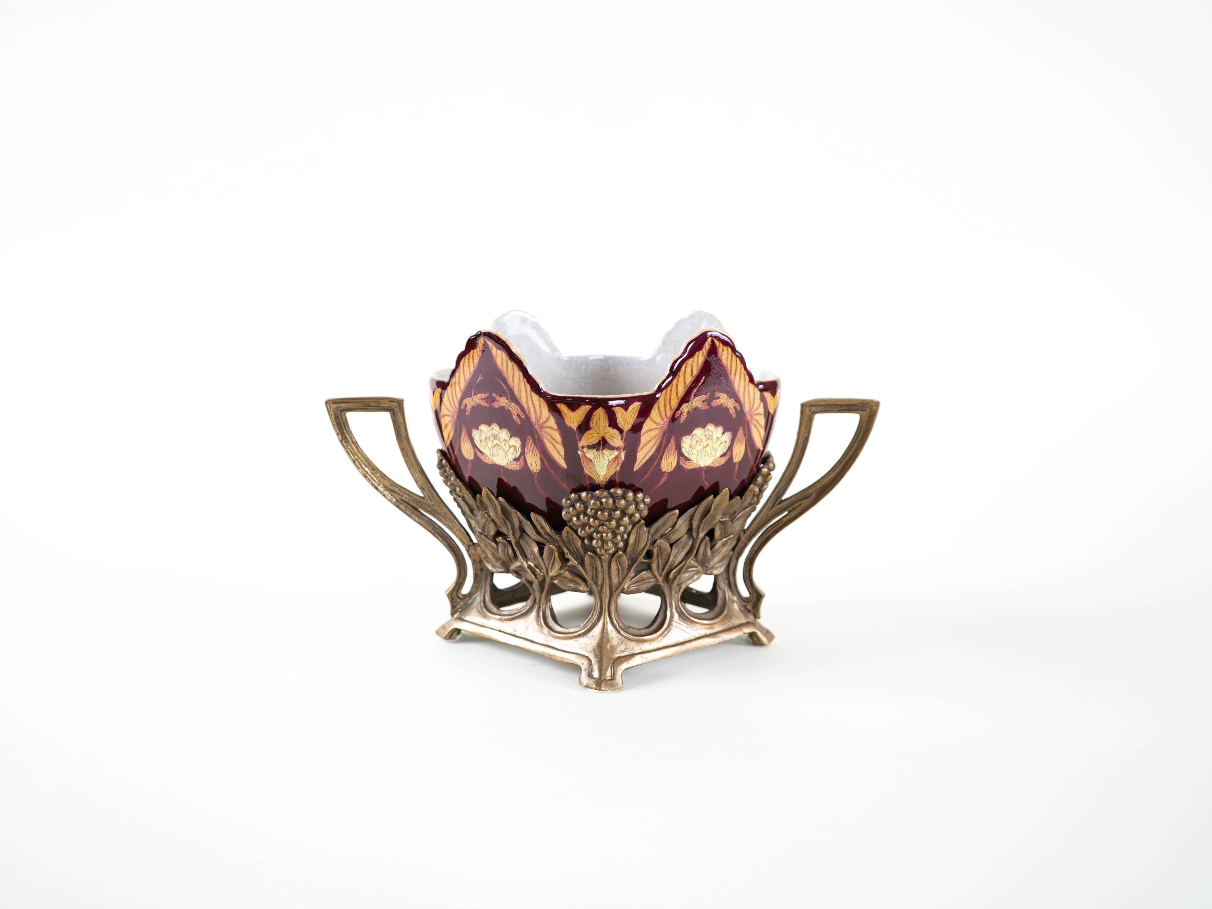 Art Nouveau ceramic platter in gilded basket with grapevine motif, Europe