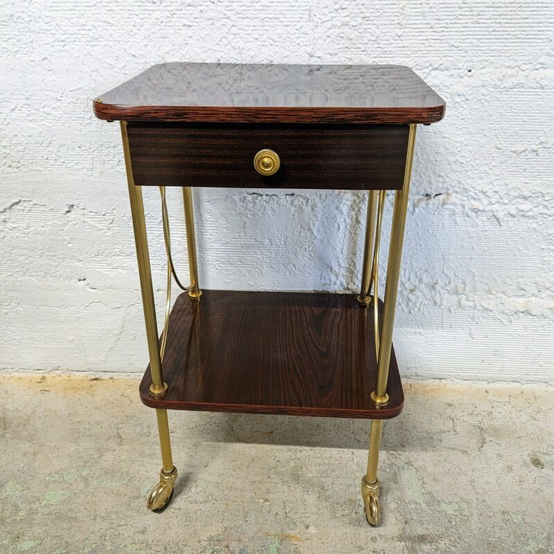 Vintage bedside table with wheels